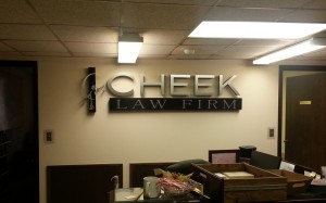 The custom logo sign designed for Cheek Law Firm installed.