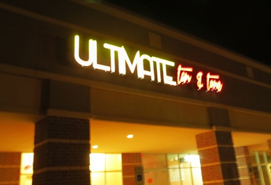 Nighttime picture of Ultimate Tan and Tone's new LED building sign.
