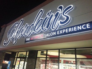 Photo of large logo sign for salon.