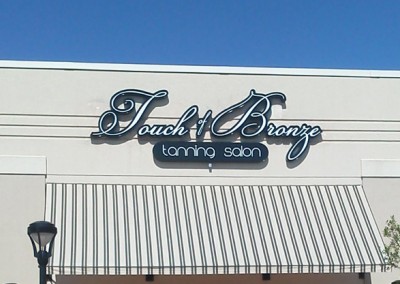 Picture of tanning salon sign.