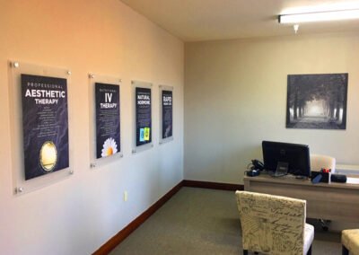 Photo of acrylic wall posters in an office.