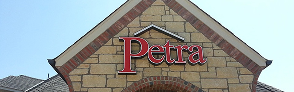 Channel letter sign for Petra Roofing designed and provided by Electremedia.