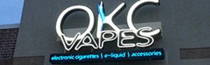 okcvapes slider illustration of sign design and fab.