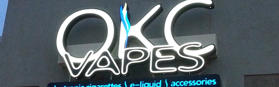 OKC Vapes channel letter sign illuminated.