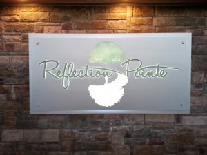 Front photograph of new custom wall sign.