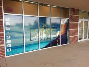 An image of a 5-panel window mural for a tanning salon.